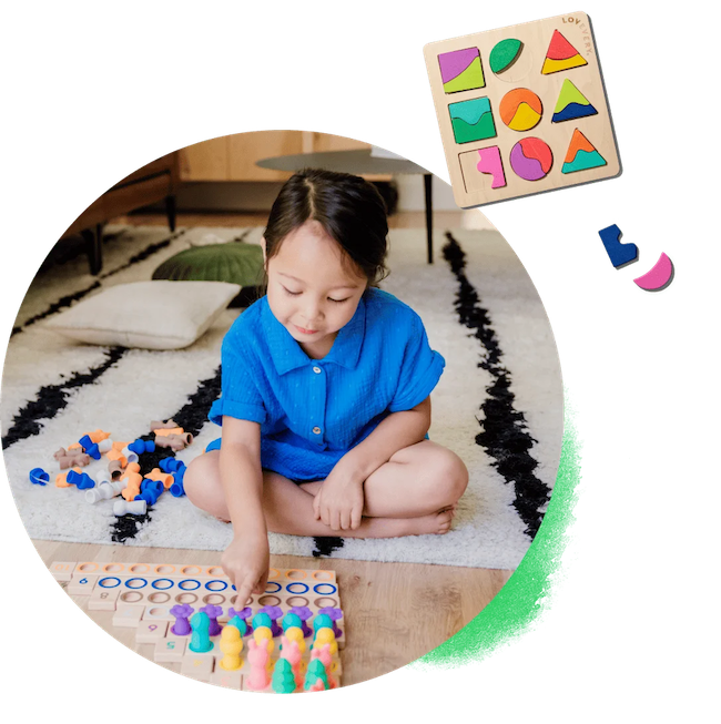 3-year old playing with toys from The Play Kits by Lovevery