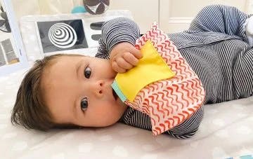 Baby with the Crinkle Bag from The Charmer Play Kit