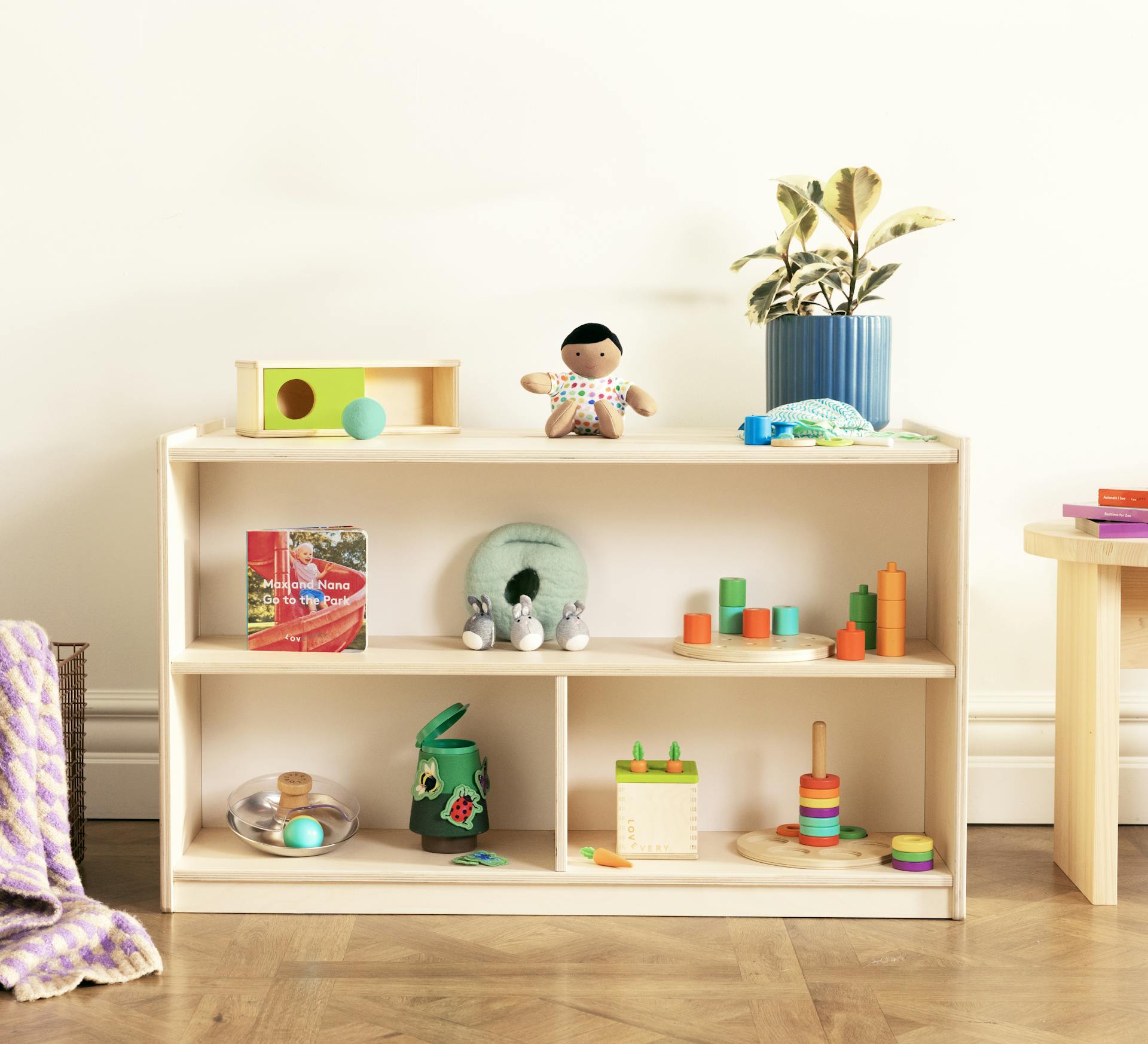 The Montessori Playshelf filled with playthings from Lovevery