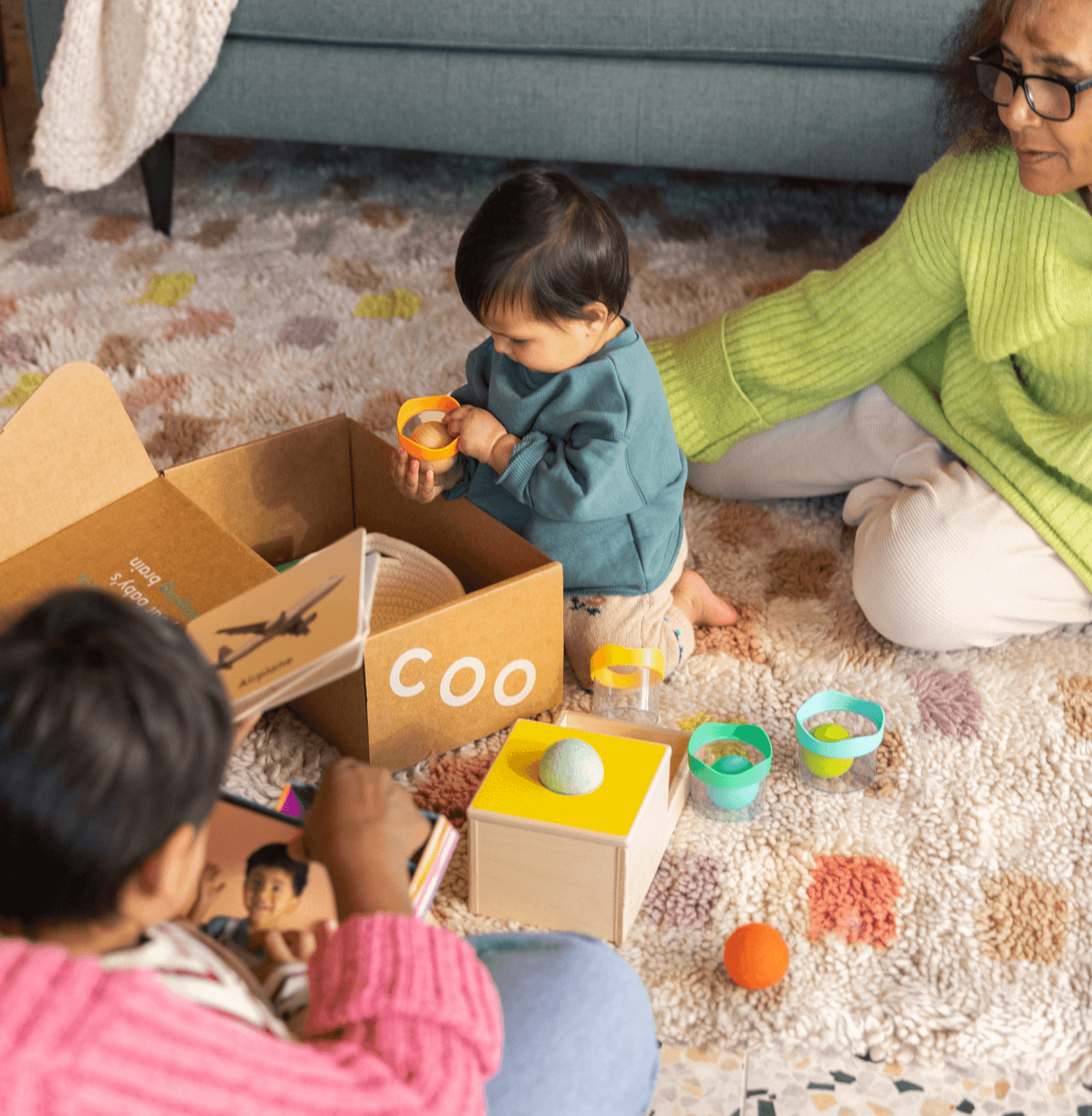 Child opening up The Inspector Play Kit box