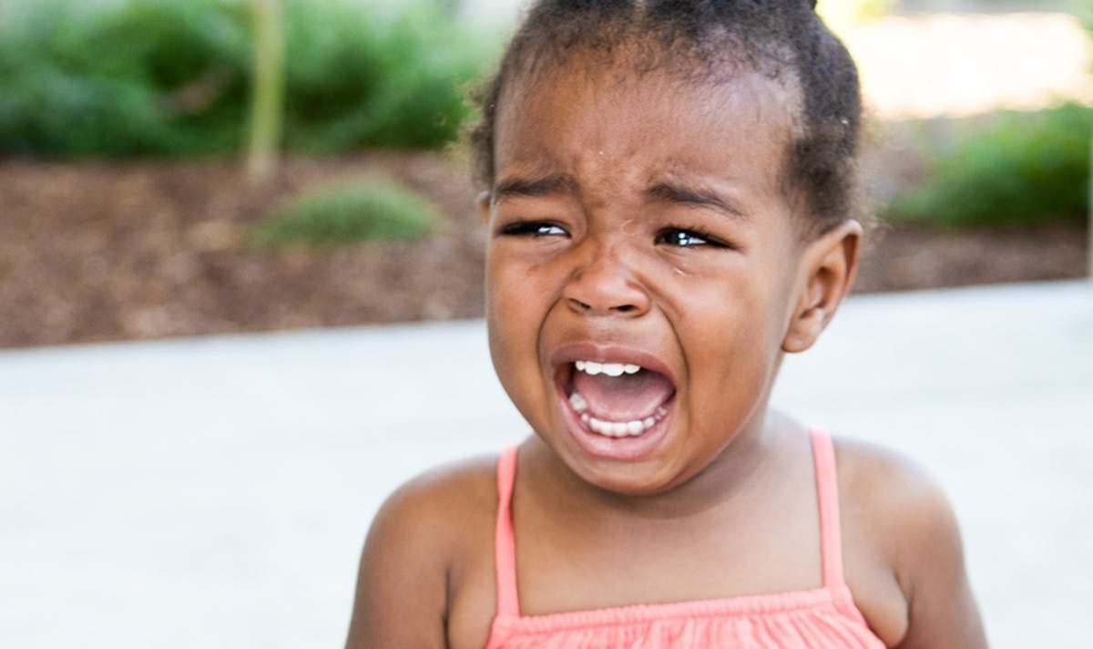 sad black child crying